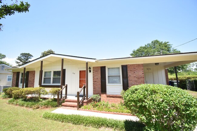 Building Photo - First Month Rent Free: Updated 3 Bedroom a...