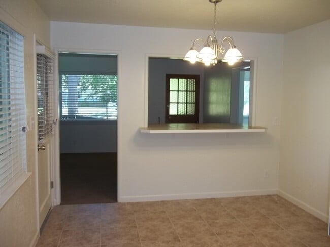 Building Photo - Updated home offering a nice floor plan an...