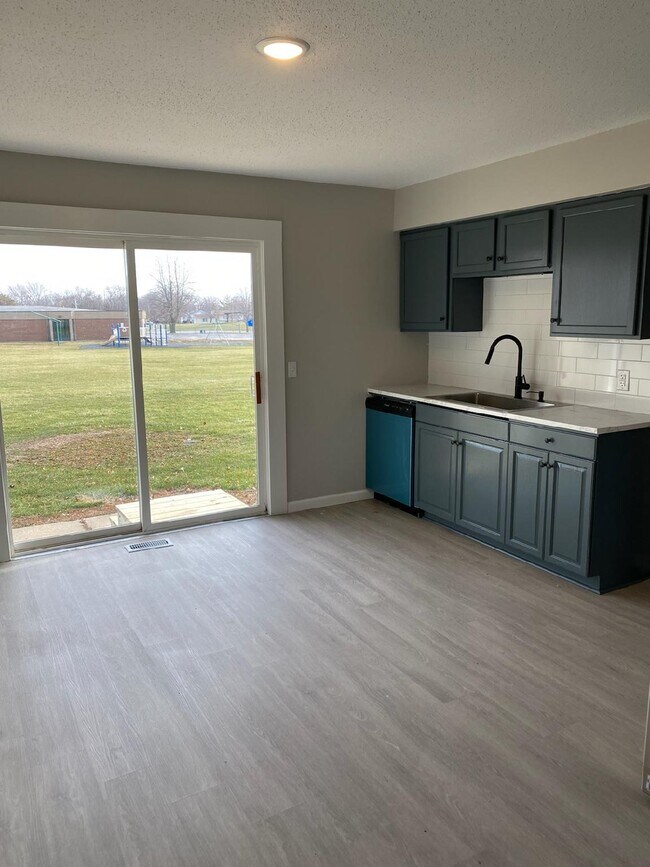 Kitchen and Deck - 5417 N Linwood Ave