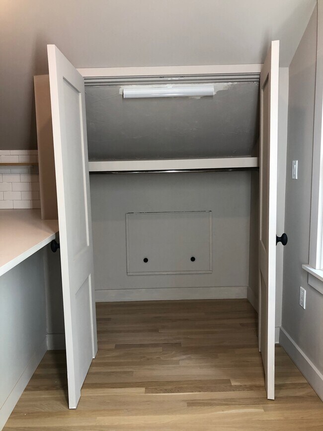 Front closet with hanging rod and shelf - 30 Allandale St