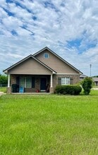 Building Photo - 1220 14th E Ave