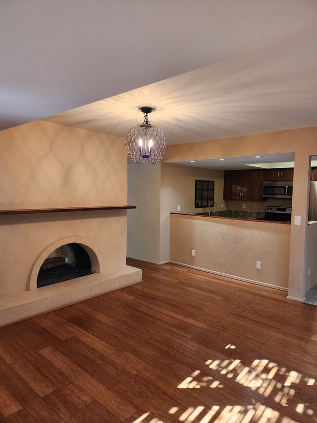 Wood-burning, double-sided fireplace - 5690 N Camino del Sol