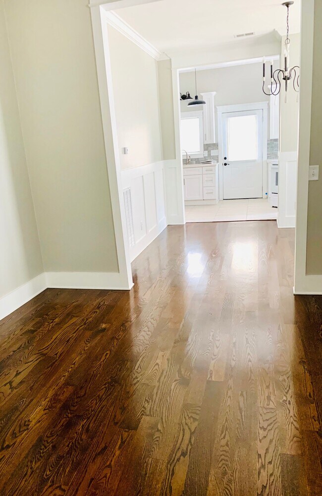 View thru living room to dining & kitchen - 124 Forrest St