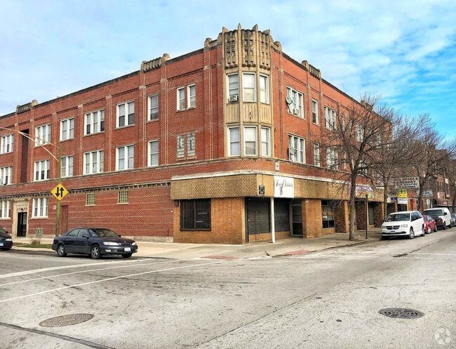 Building Photo - 7451 S Vernon Ave