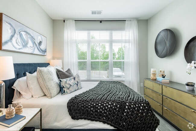 Primary Bedroom with Scenic Views, B2 Floorplan | Velo Village | Apartment in Franklin WI - Velo Village Apartments