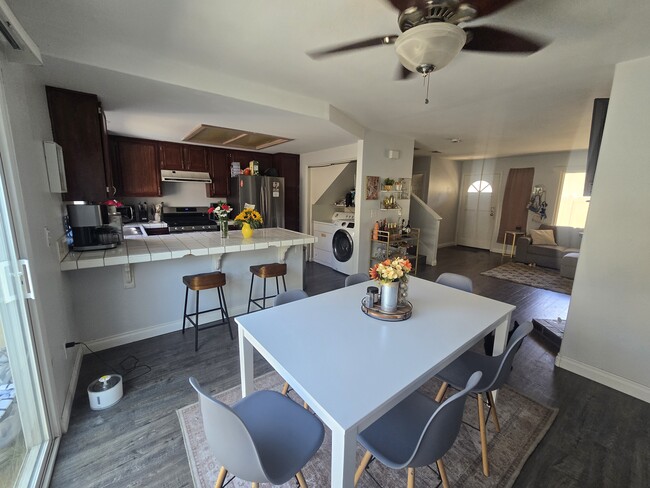 Kitchen open to dining room - 1668 Grand Ave