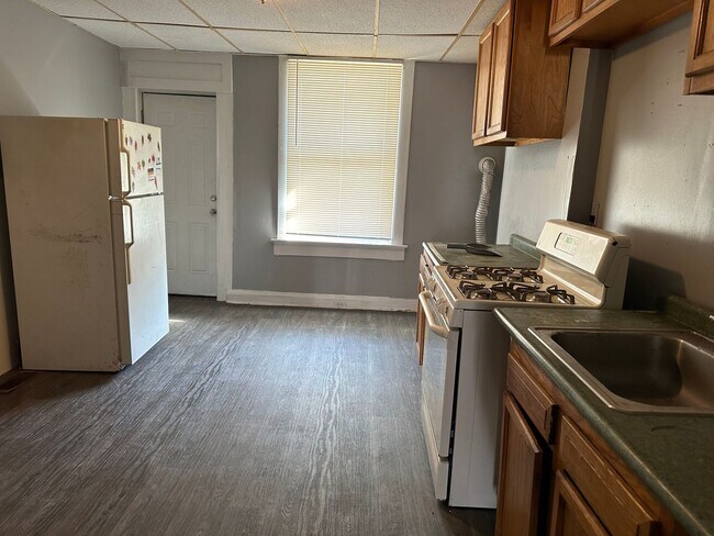 Building Photo - Spacious Rooms! Partially Finished Basemen...