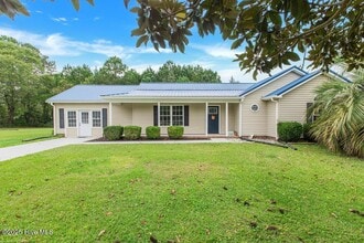 Building Photo - 304 Woody Way