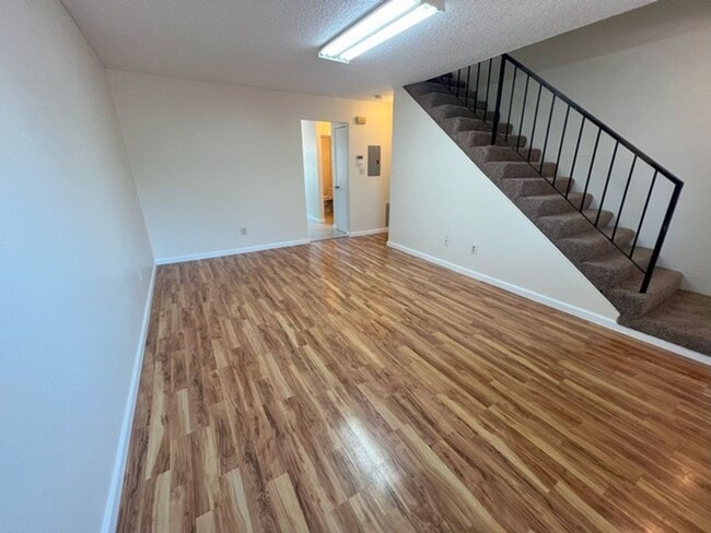 Building Photo - Three Bedroom Two and half Bathroom Tri...