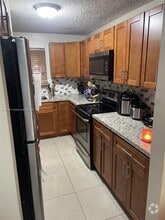 Building Photo - 6060 W 21st Ct
