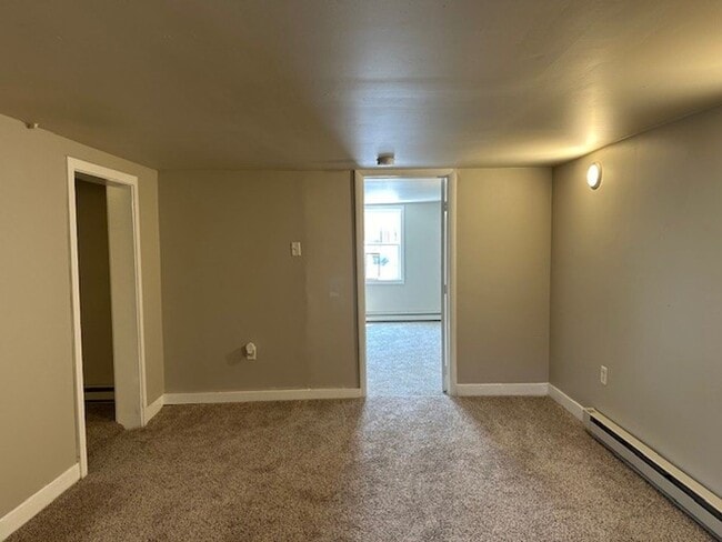 Building Photo - Introducing our cozy 2-bedroom, 1-bathroom...