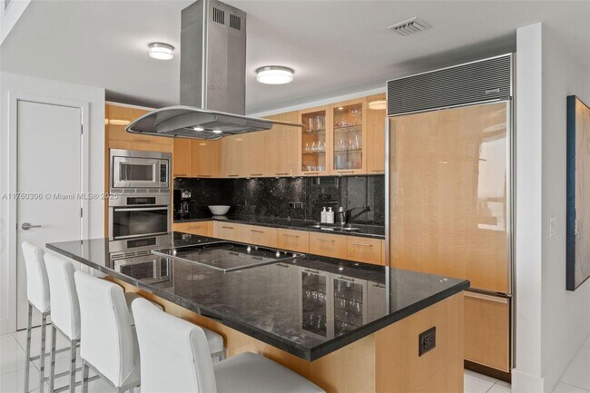 Building Photo - 6899 Collins Ave