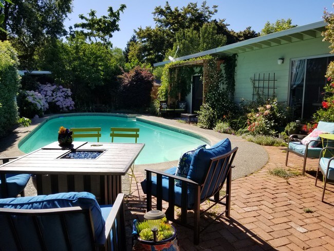 Guest unit overlooks pool and garden. - 155 Jefferson St