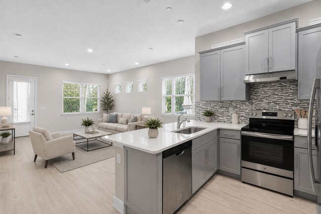 Building Photo - Move In Ready End Unit Townhome in Laureate Park | 3 Bed | Tesla Charger