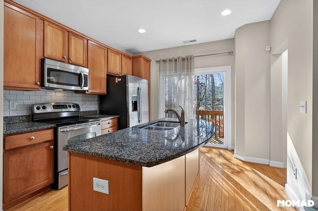 Foto del edificio - 8745 Cypress Grove Run