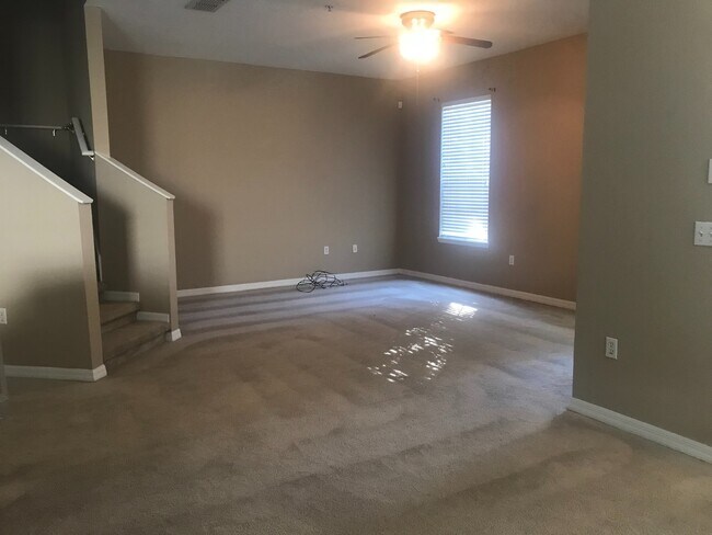 Building Photo - MOVE IN SPECIAL- Beautiful 3/2.5 Harmony Condo.