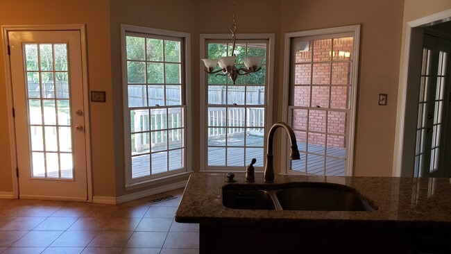 Kitchen view of back deck - 24985 Capshaw Rd
