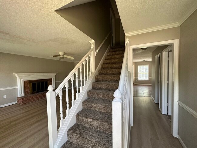 Building Photo - 6515 Pine Cone Cove - Available Now!
