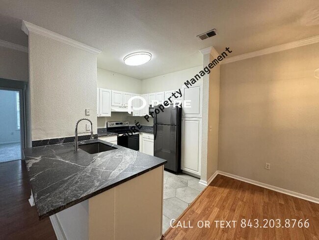 Building Photo - 3 bed FIRST FLOOR ADA condo Available Now ...
