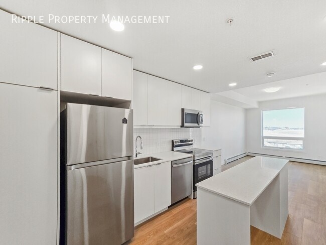 Photo du bâtiment - MODERN 1-BED CONDO | BELVEDERE PREMIER LIVING | SLEEK FINISHES