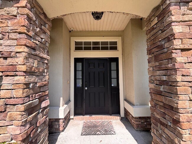 Foto del edificio - Spacious 4BR Waterfront Home with Bonus Room & Fenced Yard!