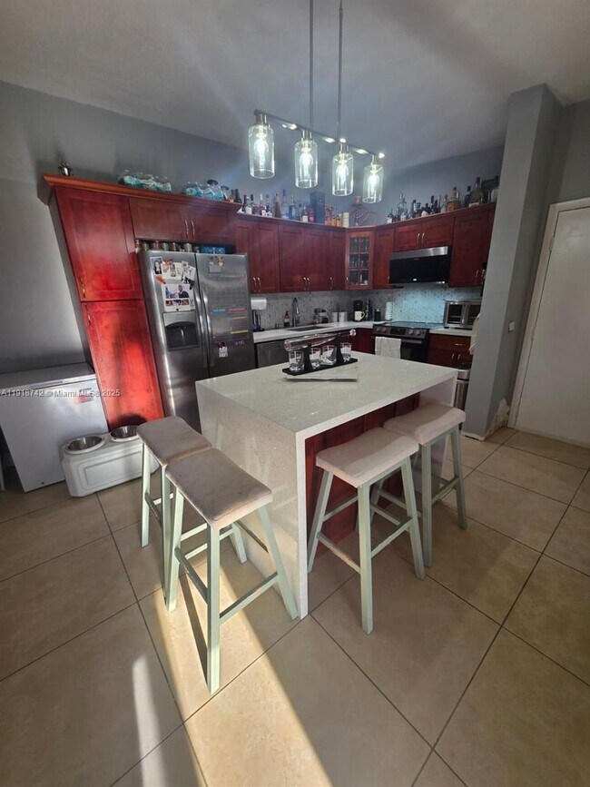 Foto del edificio - 9727 Hammocks Blvd