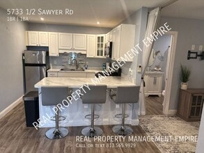 Building Photo - 5733 Sawyer Rd