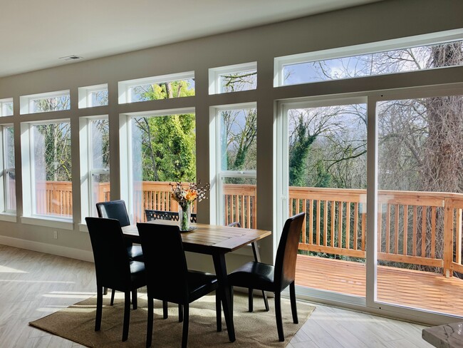 Dining looking at main level deck - 652 Lind Ave NW