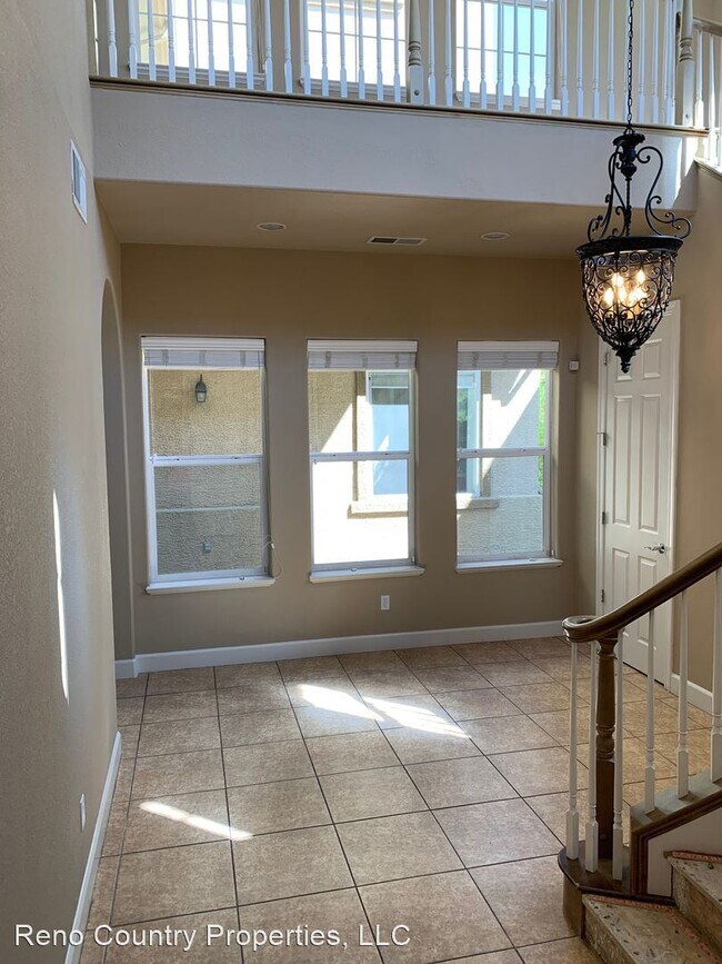 Building Photo - 4 br, 3.5 bath House - 10820 Serratina Dr