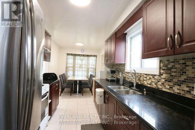 Building Photo - 77 Enchanted Hills Crescent