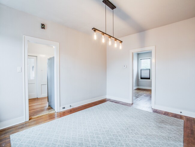 Dining Room leading to Kitchen and Bedroom #1. - 1007 W Craig Pl