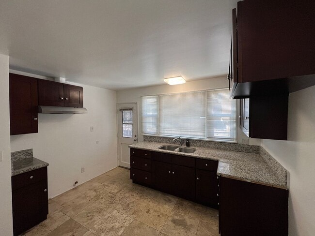 Building Photo - 51st Street Apartments Triplex