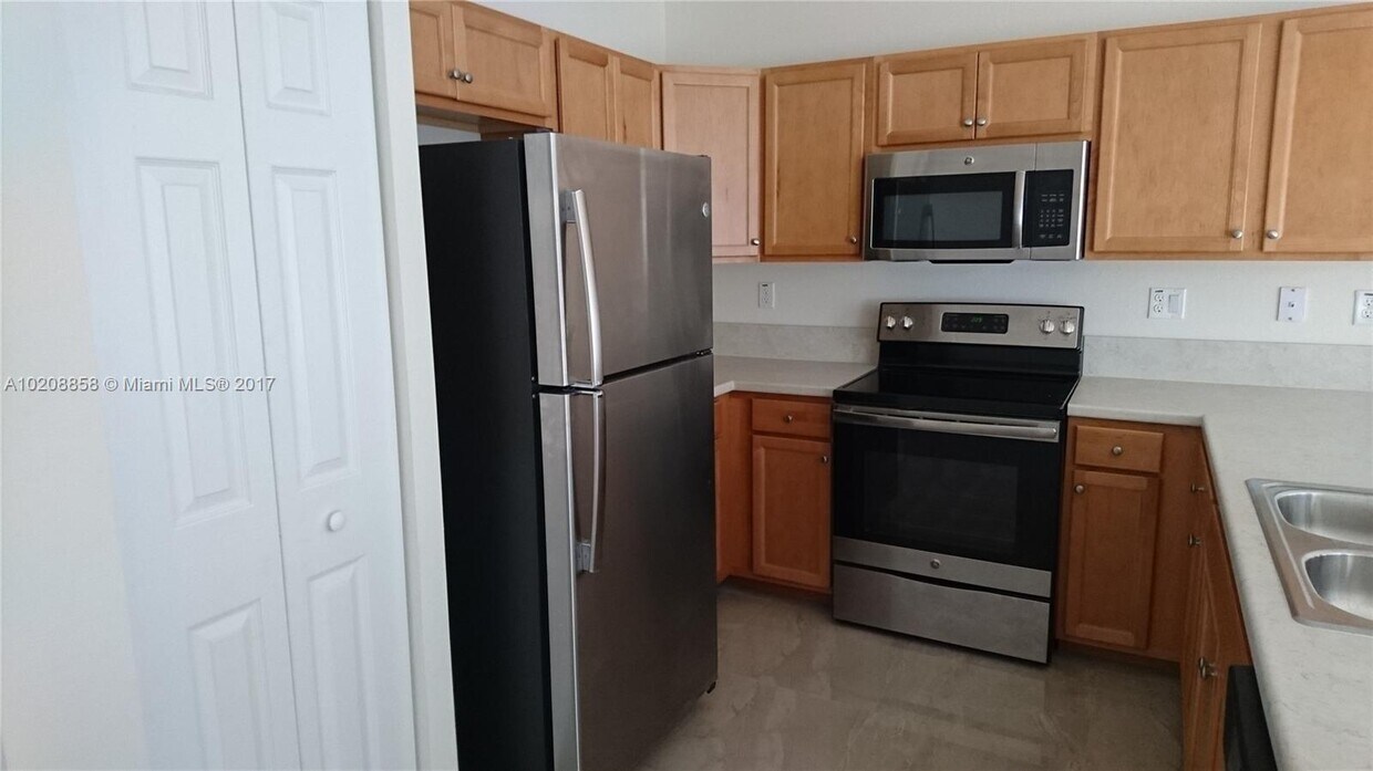 Building Photo - 9246 W 33rd Ln