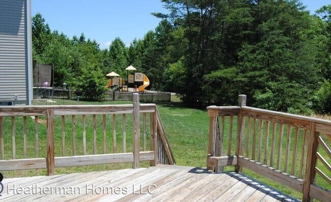 Building Photo - 3 br, 3.5 bath House - 6027 Hot Spring Lane