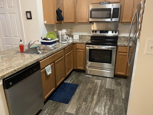 Upgraded unit kitchen - Sunnyside Apartments