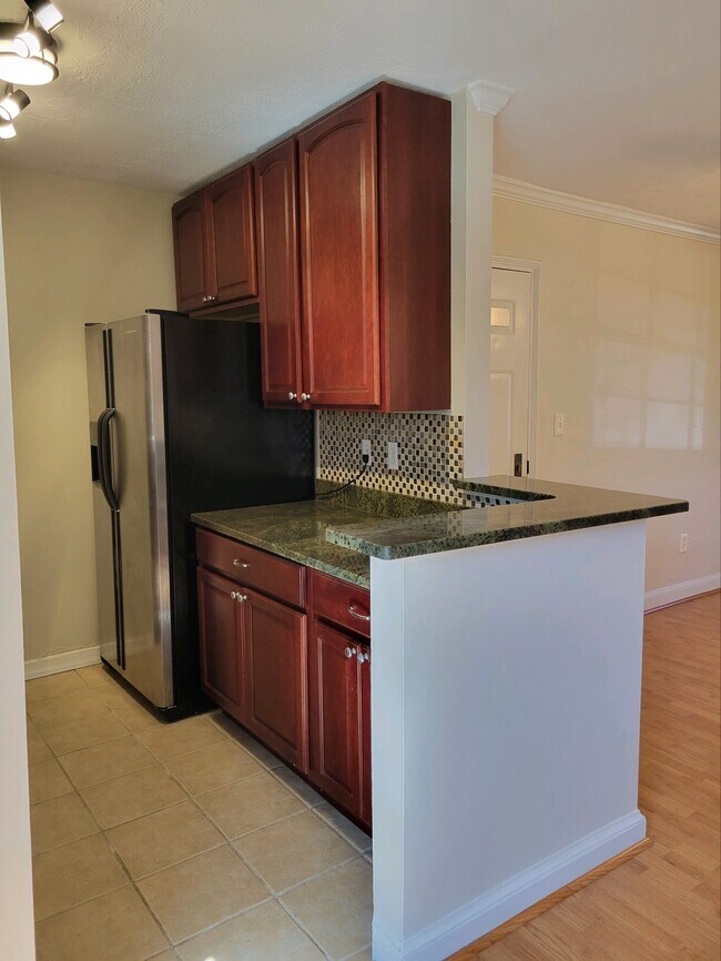 Granite bar countertop - 1718 W Abingdon Dr