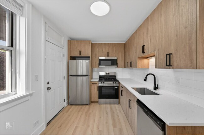 Foto del edificio - 6312 N Artesian Ave