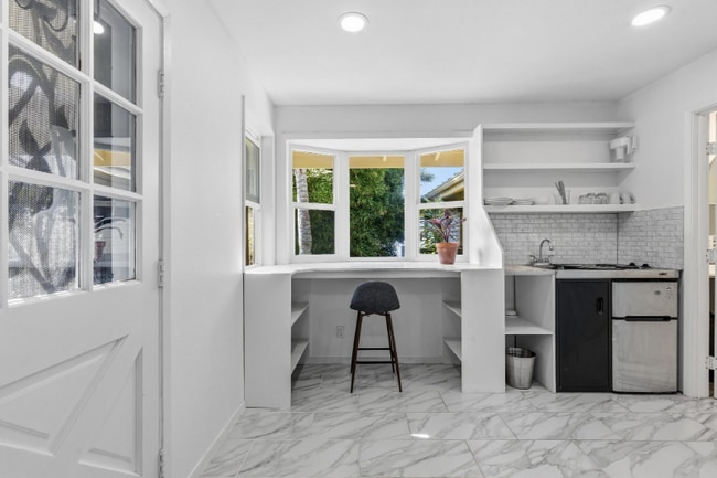 Building Photo - 82-5909-5909 Coffee Royal Pl