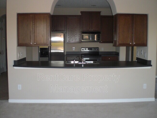 Building Photo - 9649 Moss Rose Way