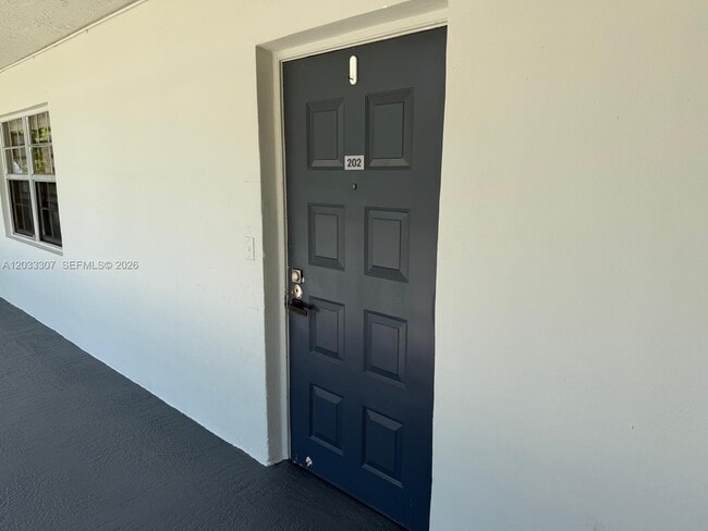Building Photo - 4261 W Palm Aire Dr
