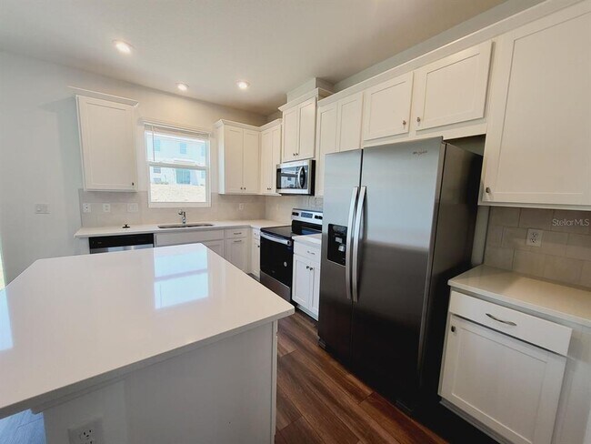 Foto del edificio - 1184 Lakeshore Breeze Pl