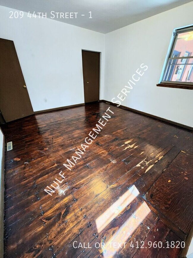 Building Photo - 209 44th St