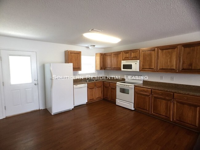 Building Photo - First Month FREE - Lease Now!