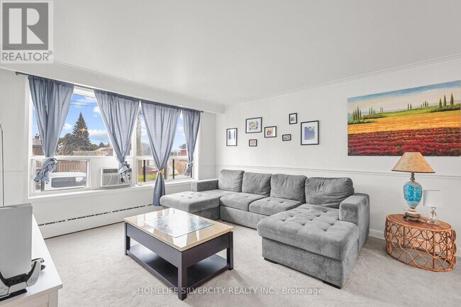 Photo du bâtiment - 430-430 Ridelle Ave