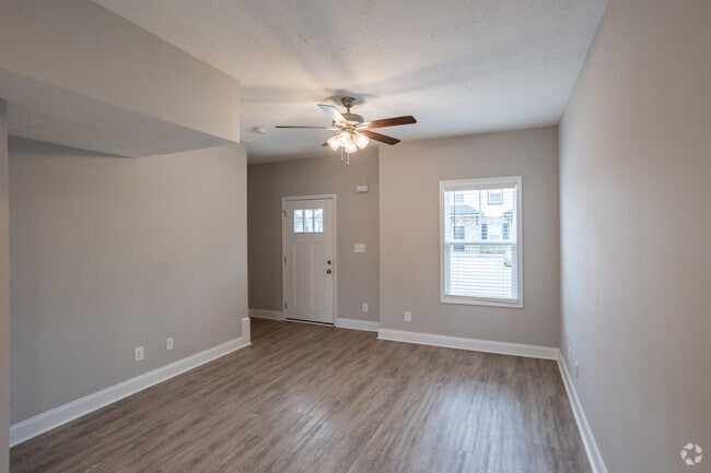 2BR, 2.5BA - 1,100SF - Living Room - Golf Club Ln - 1625