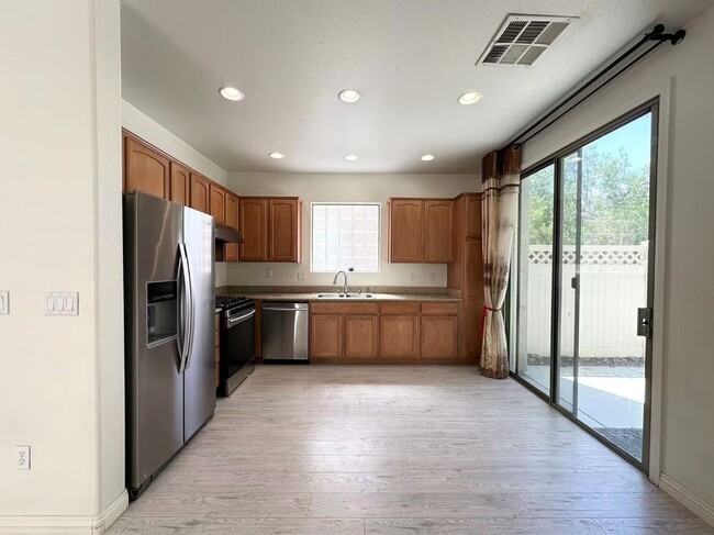 Building Photo - Spacious 4-Bedroom Home in Gated Community...