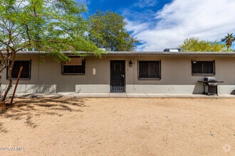 Building Photo - 1402 W Becker Ln