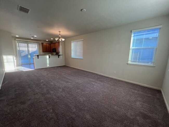 Building Photo - Freshly painted home with new carpet.