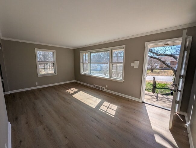 Photo - Fully Renovated Home with Sunroom, Garage & Huge Fenced Yard