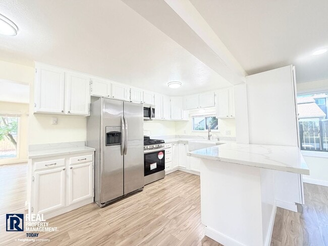 Building Photo - Completely Remodeled 4BR Home with Massive Shop/Garage & Large Fenced Yard